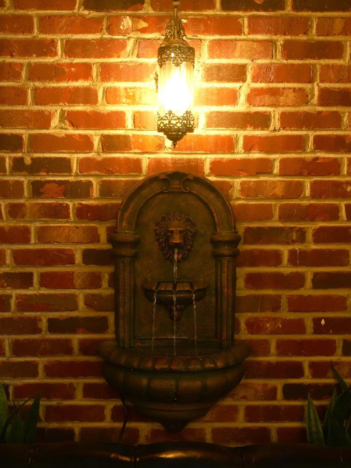 Lion fountain feature at Books N' Cup Manhattan