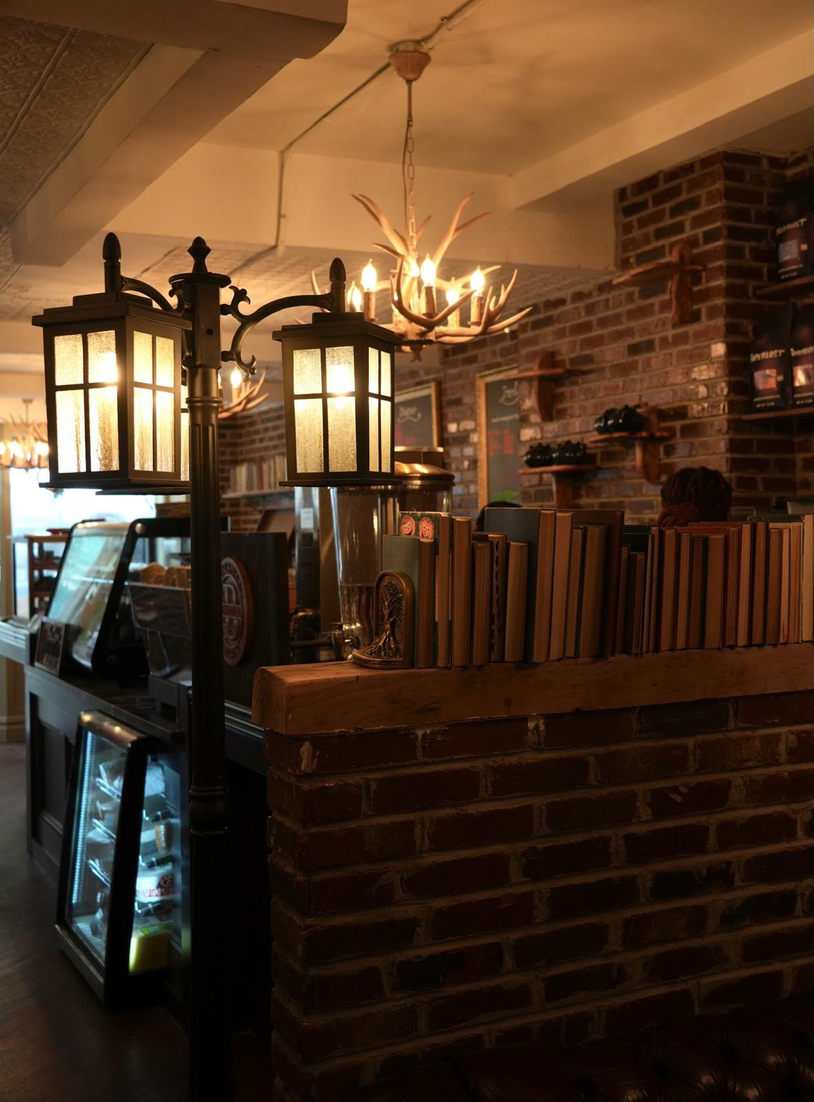 Lantern lighting over the counter at Books N' Cup Manhattan